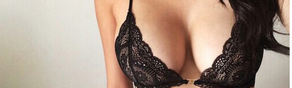 woman's bust in black bra