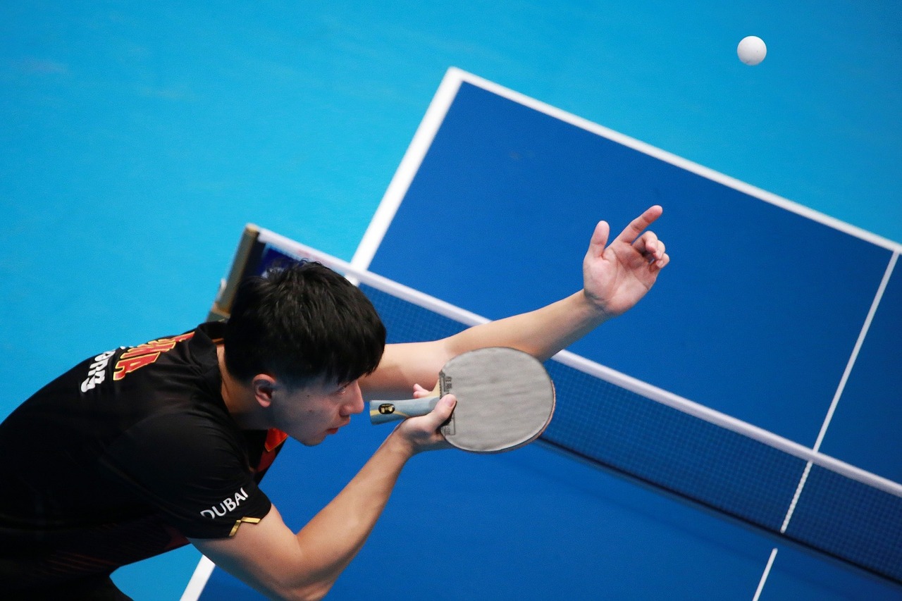 man playing ping pong